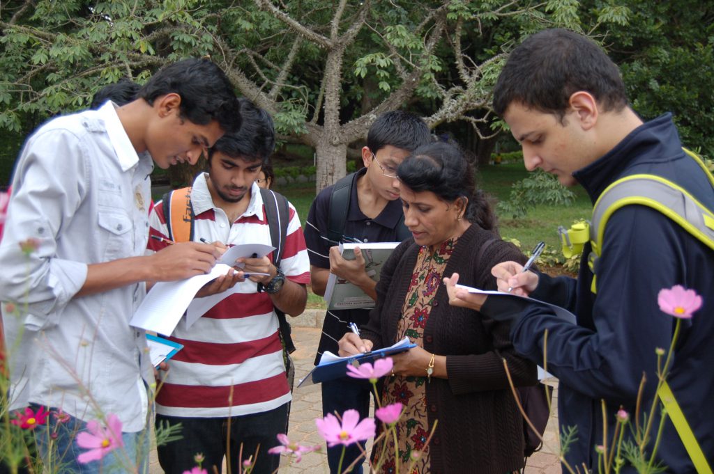 Thresiamma with the 2012 batch of UG students during an ant collection practical on campus