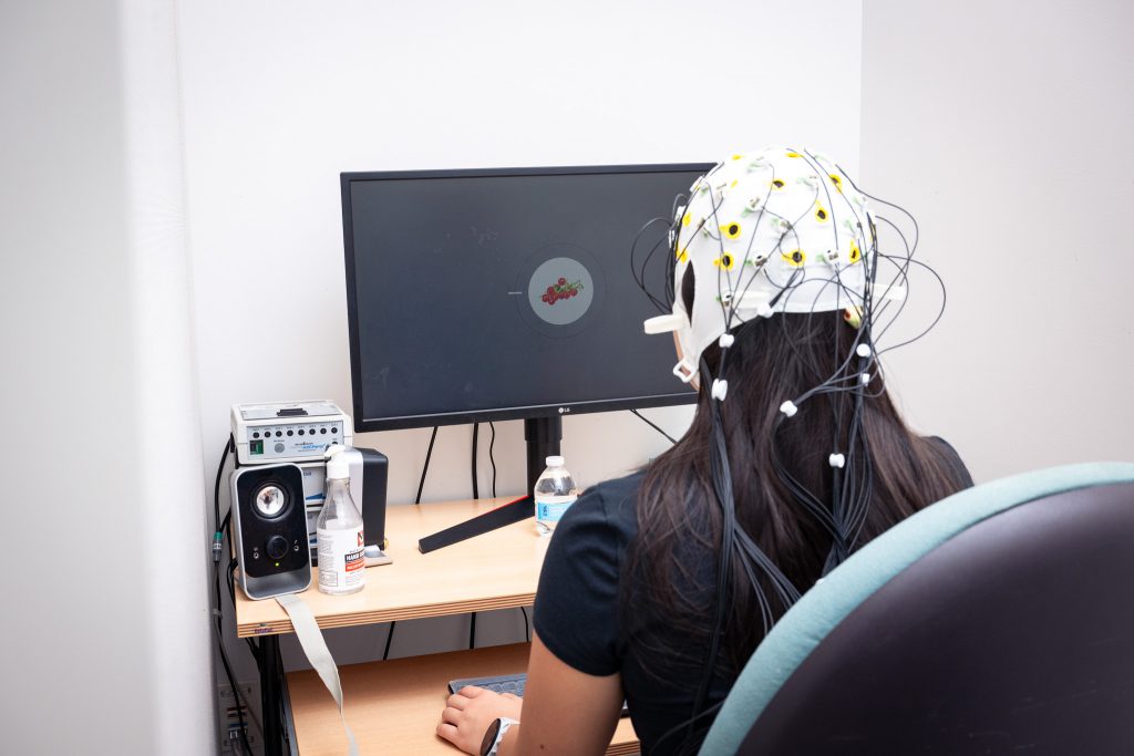 A participant’s brain activity is measured during a memory task using electroencephalography (EEG) for a study as part of the Cognitive Neurocomputational Research and Clinical Assessment in Schizophrenia (CNTRaCS) consortium project