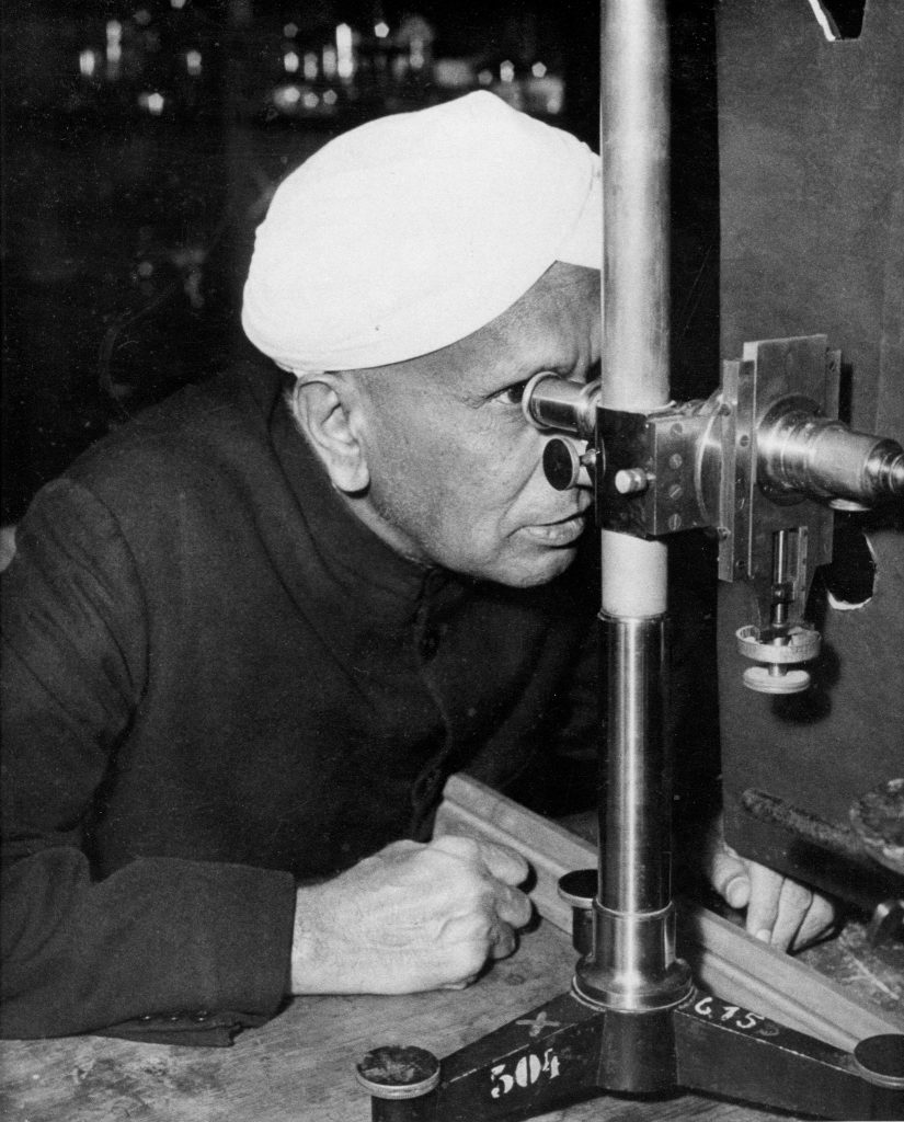 CV Raman with a spectroscope (Photo courtesy: Raman Research Institute) 