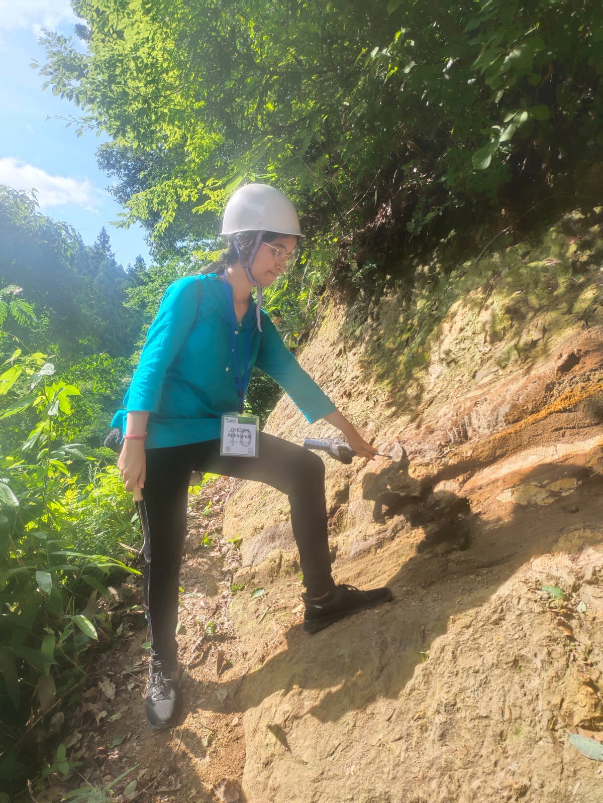 Abhinanda Ghosh looking for fossils in Site 3 of a sedimentary basin outcrop in Niigata, Japan